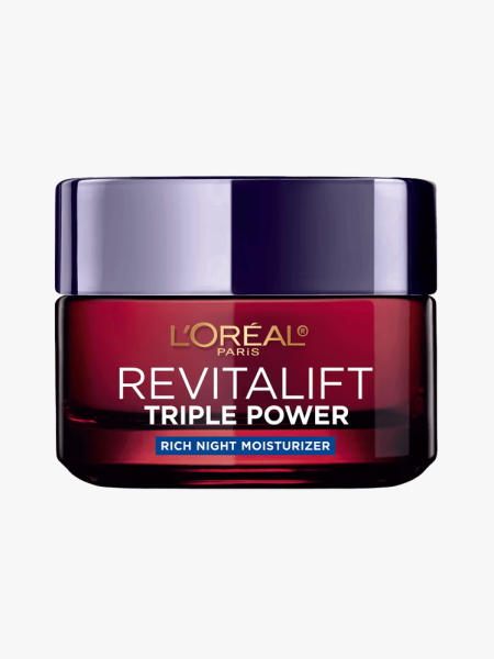 L’Oreál Paris Revitalift Triple Power Rich Night Moisturizer in branded tub component on a light gray background